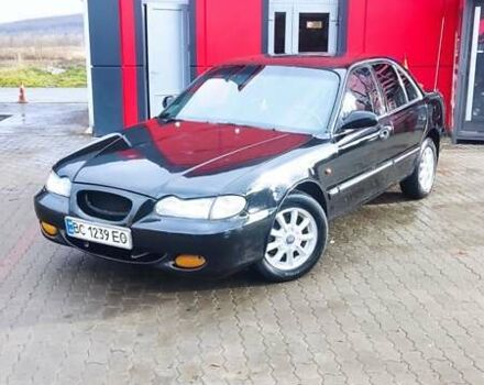 Черный Хендай Соната, объемом двигателя 2 л и пробегом 200 тыс. км за 1350 $, фото 2 на Automoto.ua