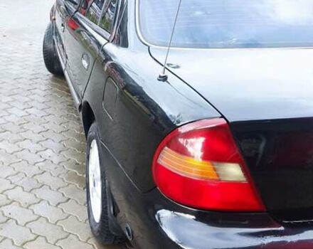 Черный Хендай Соната, объемом двигателя 2 л и пробегом 200 тыс. км за 1450 $, фото 8 на Automoto.ua