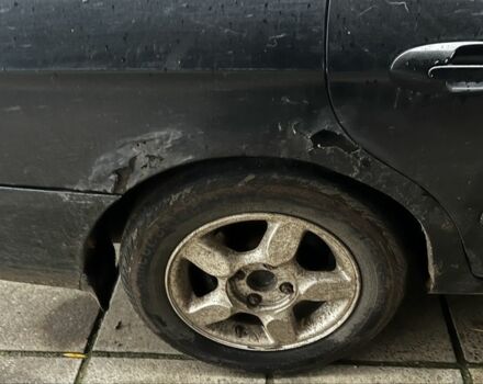 Черный Хендай Соната, объемом двигателя 2 л и пробегом 400 тыс. км за 1543 $, фото 2 на Automoto.ua