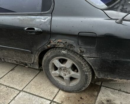 Черный Хендай Соната, объемом двигателя 2 л и пробегом 400 тыс. км за 1543 $, фото 5 на Automoto.ua