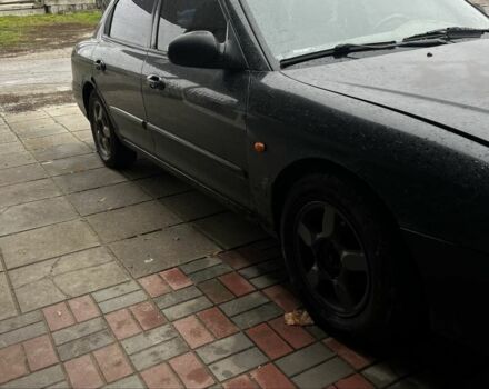 Черный Хендай Соната, объемом двигателя 2 л и пробегом 400 тыс. км за 1543 $, фото 3 на Automoto.ua