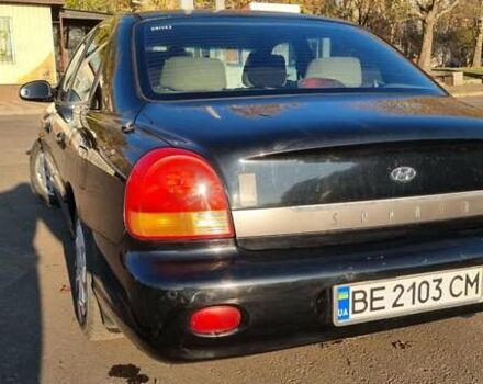 Черный Хендай Соната, объемом двигателя 2 л и пробегом 241 тыс. км за 2600 $, фото 4 на Automoto.ua