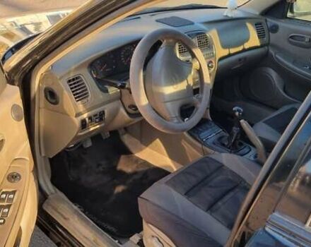 Черный Хендай Соната, объемом двигателя 2 л и пробегом 241 тыс. км за 2600 $, фото 7 на Automoto.ua