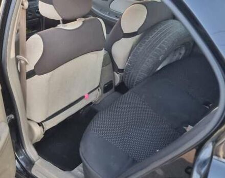 Черный Хендай Соната, объемом двигателя 2 л и пробегом 241 тыс. км за 2600 $, фото 9 на Automoto.ua