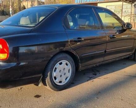 Черный Хендай Соната, объемом двигателя 2 л и пробегом 241 тыс. км за 2600 $, фото 2 на Automoto.ua