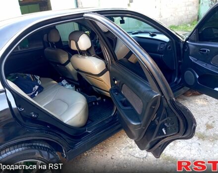 Черный Хендай Соната, объемом двигателя 2 л и пробегом 370 тыс. км за 4300 $, фото 6 на Automoto.ua