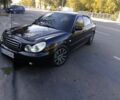 Черный Хендай Соната, объемом двигателя 2 л и пробегом 370 тыс. км за 4300 $, фото 1 на Automoto.ua