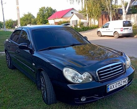 Черный Хендай Соната, объемом двигателя 2 л и пробегом 370 тыс. км за 4300 $, фото 3 на Automoto.ua