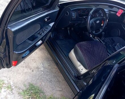 Черный Хендай Соната, объемом двигателя 2 л и пробегом 370 тыс. км за 4300 $, фото 7 на Automoto.ua