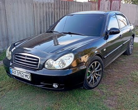 Черный Хендай Соната, объемом двигателя 2 л и пробегом 370 тыс. км за 4300 $, фото 1 на Automoto.ua