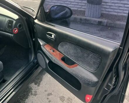 Черный Хендай Соната, объемом двигателя 2 л и пробегом 345 тыс. км за 2900 $, фото 32 на Automoto.ua