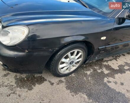 Черный Хендай Соната, объемом двигателя 2 л и пробегом 345 тыс. км за 2900 $, фото 10 на Automoto.ua