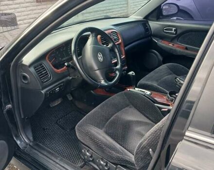 Черный Хендай Соната, объемом двигателя 2 л и пробегом 345 тыс. км за 2900 $, фото 25 на Automoto.ua