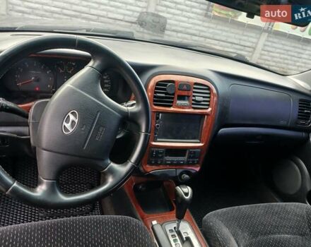 Черный Хендай Соната, объемом двигателя 2 л и пробегом 345 тыс. км за 2900 $, фото 23 на Automoto.ua