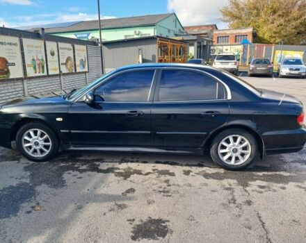 Черный Хендай Соната, объемом двигателя 2 л и пробегом 346 тыс. км за 3000 $, фото 1 на Automoto.ua