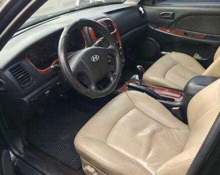 Черный Хендай Соната, объемом двигателя 2 л и пробегом 307 тыс. км за 2850 $, фото 2 на Automoto.ua