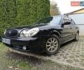 Черный Хендай Соната, объемом двигателя 2 л и пробегом 318 тыс. км за 3100 $, фото 1 на Automoto.ua