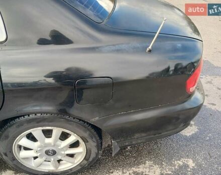 Черный Хендай Соната, объемом двигателя 2 л и пробегом 345 тыс. км за 2900 $, фото 8 на Automoto.ua