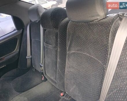 Черный Хендай Соната, объемом двигателя 2 л и пробегом 345 тыс. км за 2900 $, фото 17 на Automoto.ua