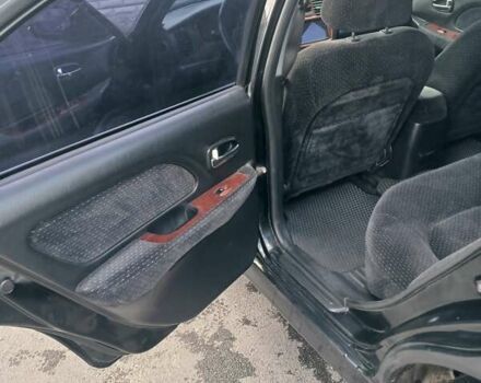 Черный Хендай Соната, объемом двигателя 2 л и пробегом 345 тыс. км за 2900 $, фото 21 на Automoto.ua