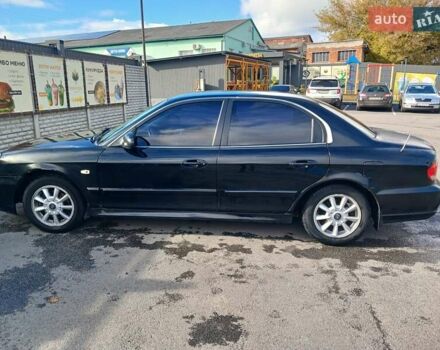 Черный Хендай Соната, объемом двигателя 2 л и пробегом 345 тыс. км за 2900 $, фото 1 на Automoto.ua