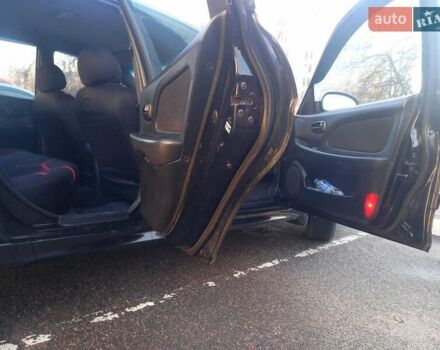 Черный Хендай Соната, объемом двигателя 2 л и пробегом 381 тыс. км за 3400 $, фото 23 на Automoto.ua