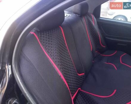 Черный Хендай Соната, объемом двигателя 2 л и пробегом 381 тыс. км за 3400 $, фото 18 на Automoto.ua