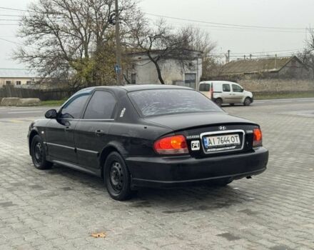 Черный Хендай Соната, объемом двигателя 2 л и пробегом 250 тыс. км за 2000 $, фото 4 на Automoto.ua