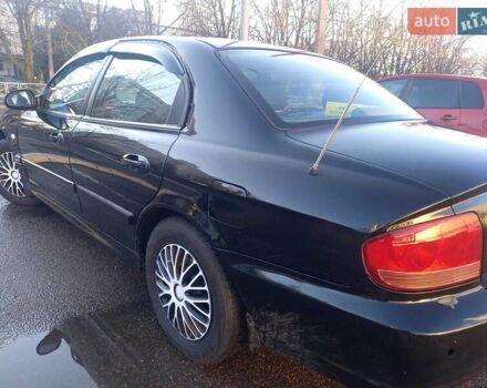 Черный Хендай Соната, объемом двигателя 2 л и пробегом 381 тыс. км за 3400 $, фото 9 на Automoto.ua