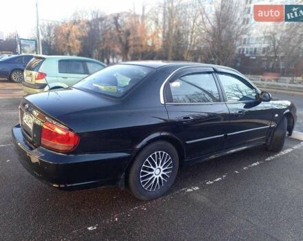 Черный Хендай Соната, объемом двигателя 2 л и пробегом 381 тыс. км за 3400 $, фото 11 на Automoto.ua