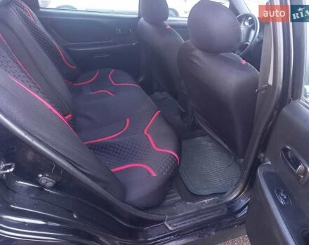 Черный Хендай Соната, объемом двигателя 2 л и пробегом 381 тыс. км за 3400 $, фото 14 на Automoto.ua
