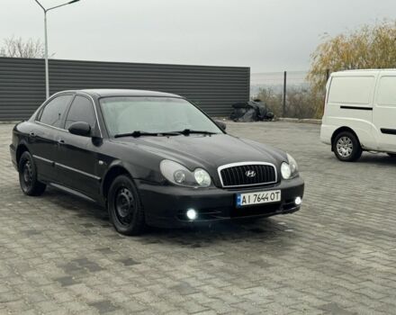 Черный Хендай Соната, объемом двигателя 2 л и пробегом 250 тыс. км за 2000 $, фото 1 на Automoto.ua