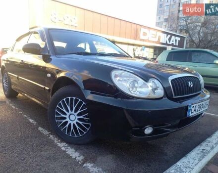 Черный Хендай Соната, объемом двигателя 2 л и пробегом 381 тыс. км за 3400 $, фото 1 на Automoto.ua