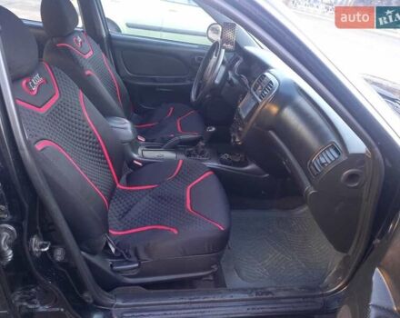 Черный Хендай Соната, объемом двигателя 2 л и пробегом 381 тыс. км за 3400 $, фото 19 на Automoto.ua