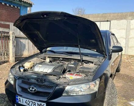 Чорний Хендай Соната, об'ємом двигуна 2.36 л та пробігом 242 тис. км за 5300 $, фото 4 на Automoto.ua