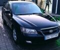 Черный Хендай Соната, объемом двигателя 2 л и пробегом 245 тыс. км за 5000 $, фото 1 на Automoto.ua