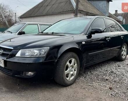 Черный Хендай Соната, объемом двигателя 2.36 л и пробегом 273 тыс. км за 6500 $, фото 1 на Automoto.ua