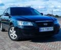 Черный Хендай Соната, объемом двигателя 2.4 л и пробегом 290 тыс. км за 5400 $, фото 1 на Automoto.ua
