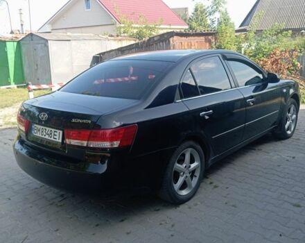 Черный Хендай Соната, объемом двигателя 2.4 л и пробегом 111 тыс. км за 5000 $, фото 3 на Automoto.ua