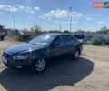 Черный Хендай Соната, объемом двигателя 2 л и пробегом 280 тыс. км за 4700 $, фото 1 на Automoto.ua