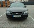 Черный Хендай Соната, объемом двигателя 2 л и пробегом 244 тыс. км за 6000 $, фото 1 на Automoto.ua