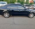 Черный Хендай Соната, объемом двигателя 2 л и пробегом 315 тыс. км за 4800 $, фото 5 на Automoto.ua