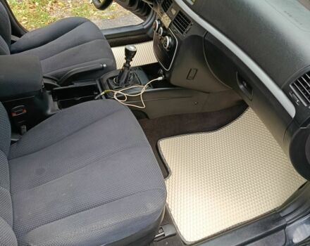 Черный Хендай Соната, объемом двигателя 2 л и пробегом 293 тыс. км за 6200 $, фото 7 на Automoto.ua