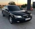 Черный Хендай Соната, объемом двигателя 2 л и пробегом 237 тыс. км за 5350 $, фото 1 на Automoto.ua