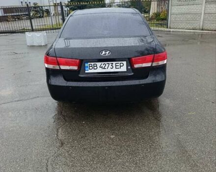 Черный Хендай Соната, объемом двигателя 2.4 л и пробегом 350 тыс. км за 7000 $, фото 1 на Automoto.ua