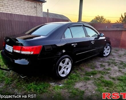 Черный Хендай Соната, объемом двигателя 2 л и пробегом 240 тыс. км за 6000 $, фото 3 на Automoto.ua