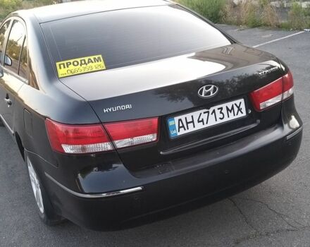 Чорний Хендай Соната, об'ємом двигуна 2.4 л та пробігом 235 тис. км за 5600 $, фото 1 на Automoto.ua