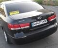 Чорний Хендай Соната, об'ємом двигуна 2.4 л та пробігом 235 тис. км за 5600 $, фото 1 на Automoto.ua