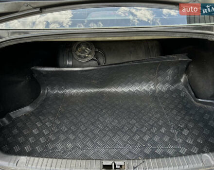 Черный Хендай Соната, объемом двигателя 2 л и пробегом 270 тыс. км за 5400 $, фото 15 на Automoto.ua