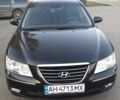 Чорний Хендай Соната, об'ємом двигуна 2.4 л та пробігом 235 тис. км за 5600 $, фото 1 на Automoto.ua
